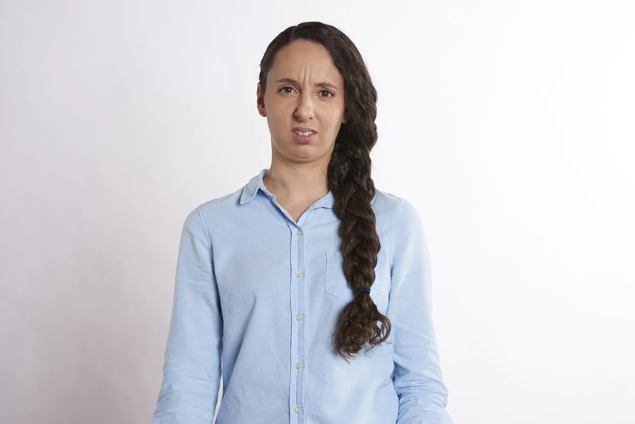 Photo showing confused, woman, doubt and female.