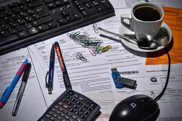 Photo showing bookkeeper, accountant and office.