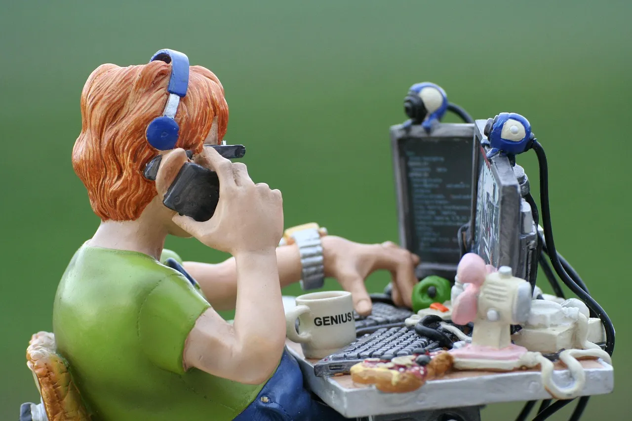 Photo showing programmer, computer, code and programming.