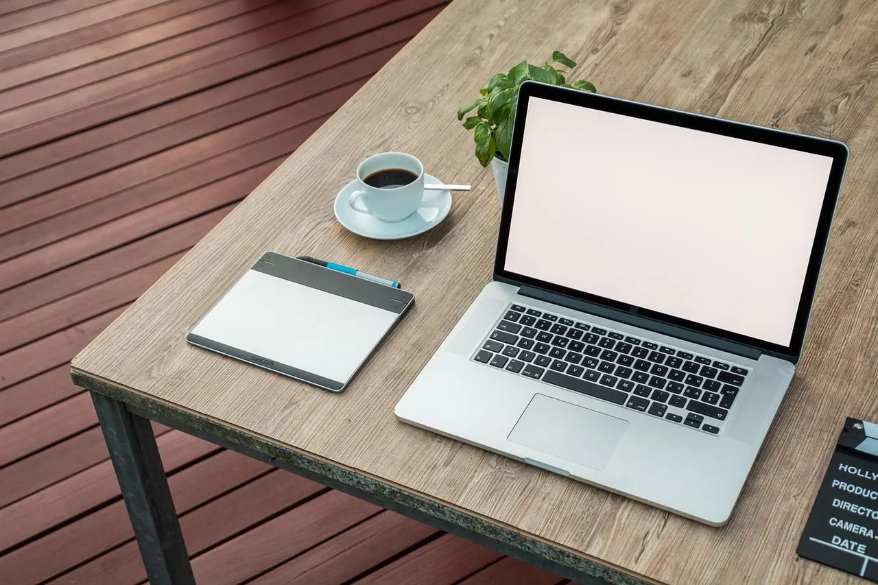 Photo showing workspace, laptop, photoshop and designer.